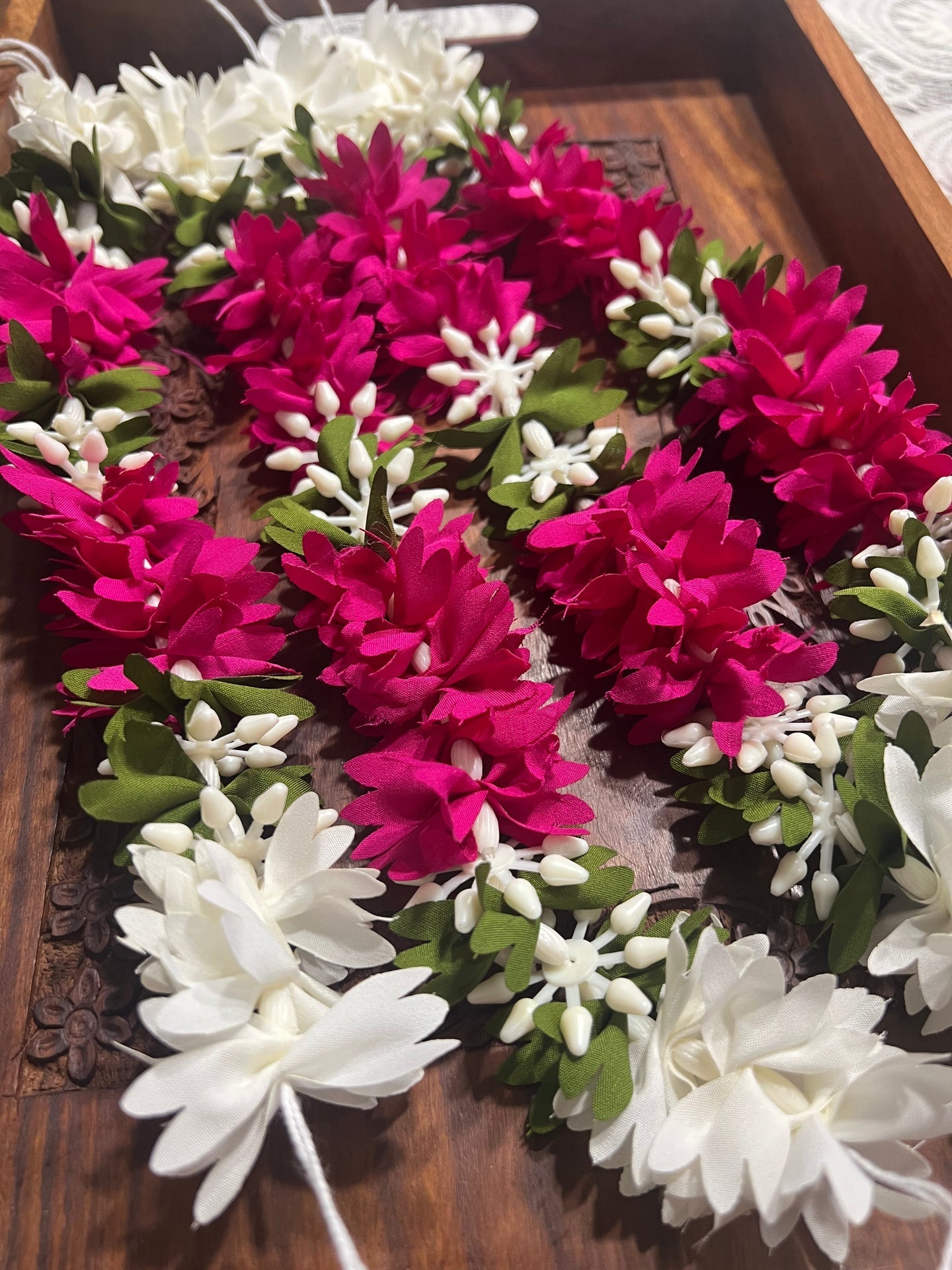 Gajra: Immitation flower strings , hair accessories