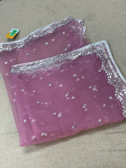 Light pink net dupatta with silver sequin border