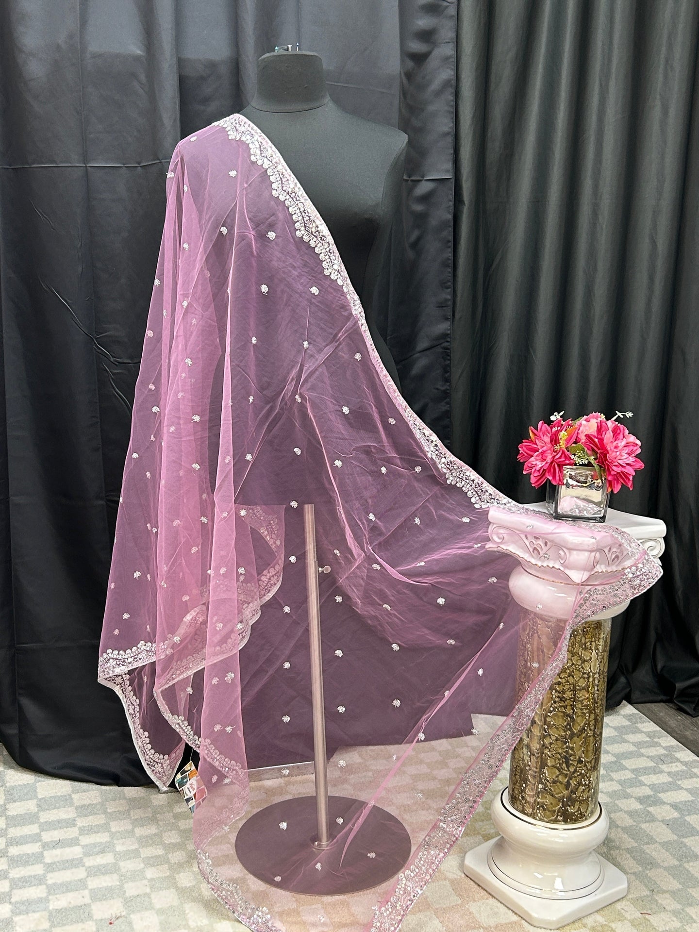 Light pink net dupatta with silver sequin border