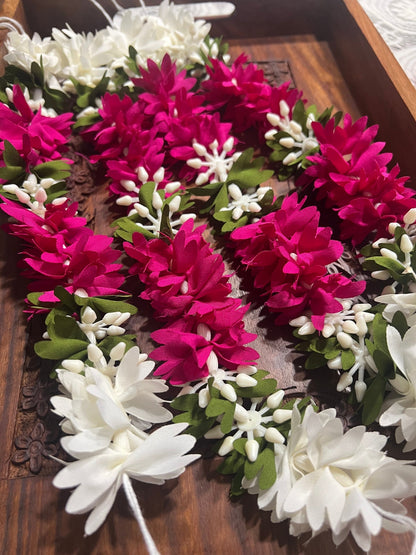 Gajra: Immitation flower strings , hair accessories
