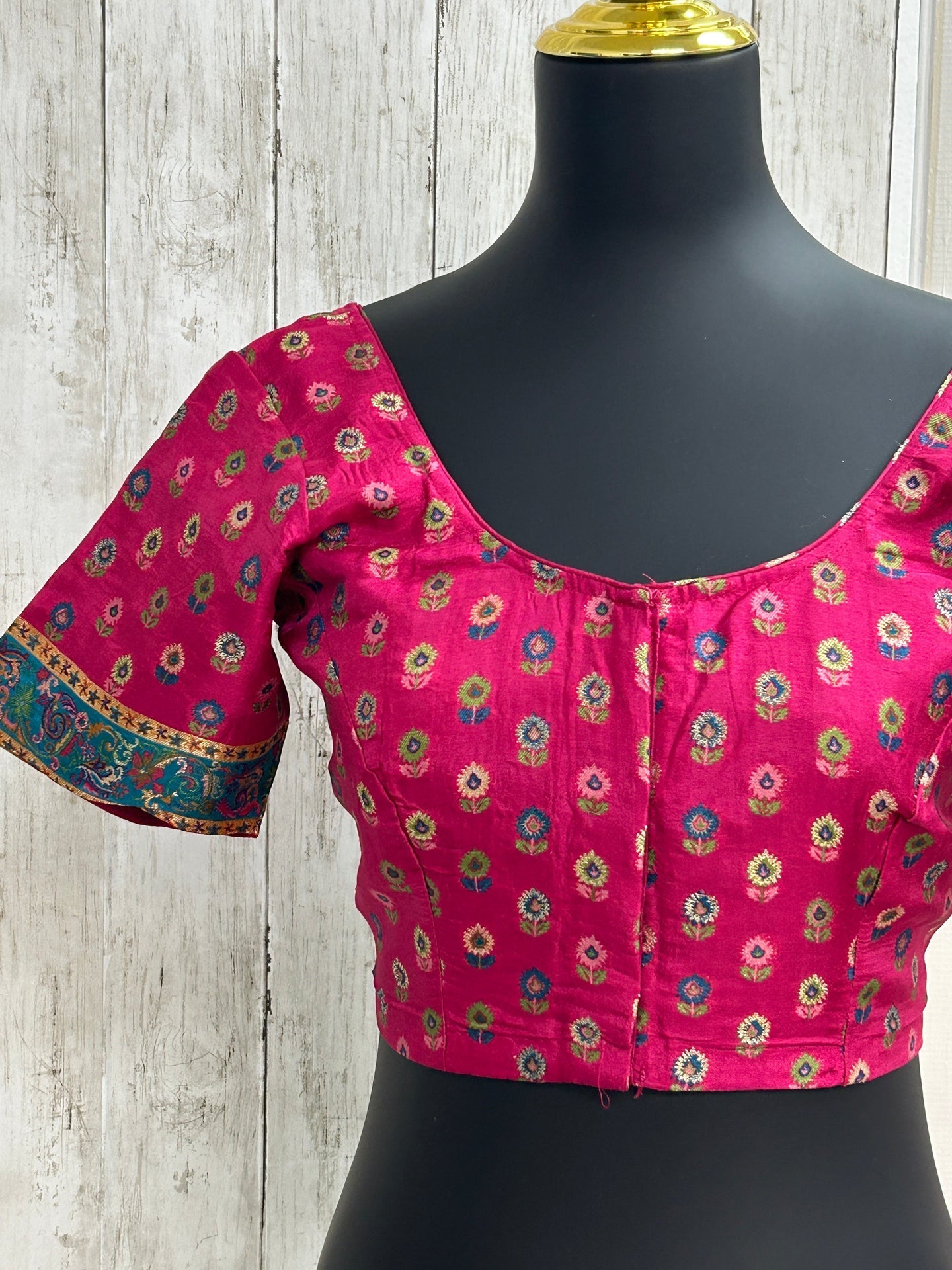 Silk blouse with teal blue detailing